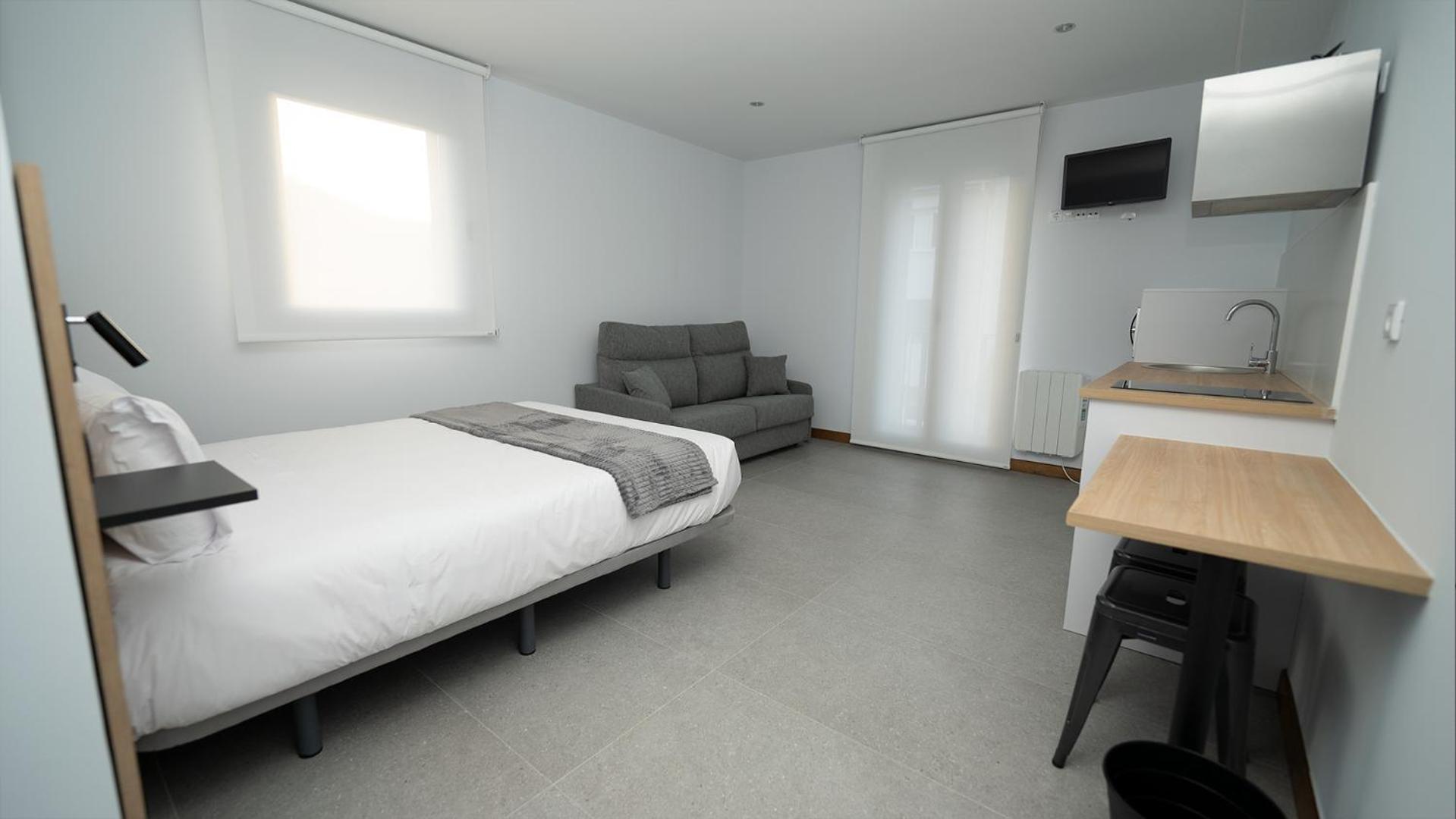 Apartamentos Puerta De Occidente Cornellana Luaran gambar