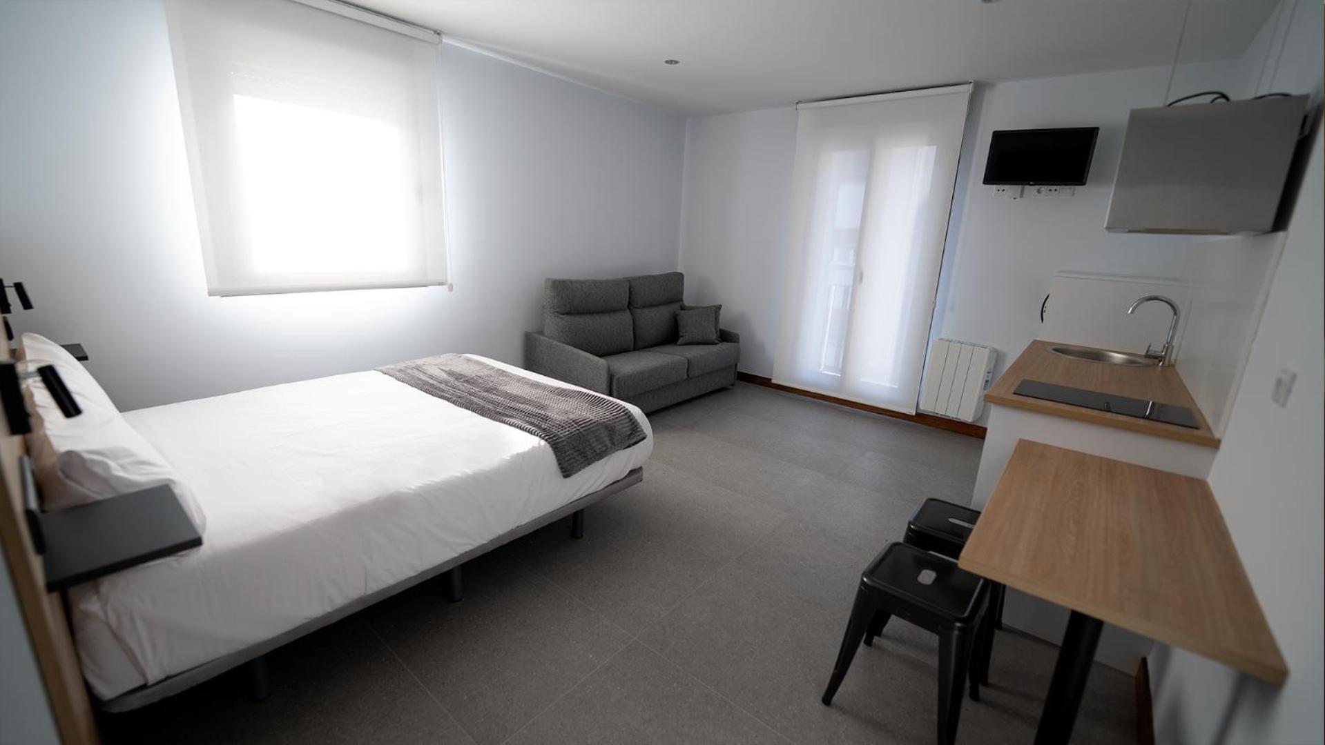 Apartamentos Puerta De Occidente Cornellana Luaran gambar